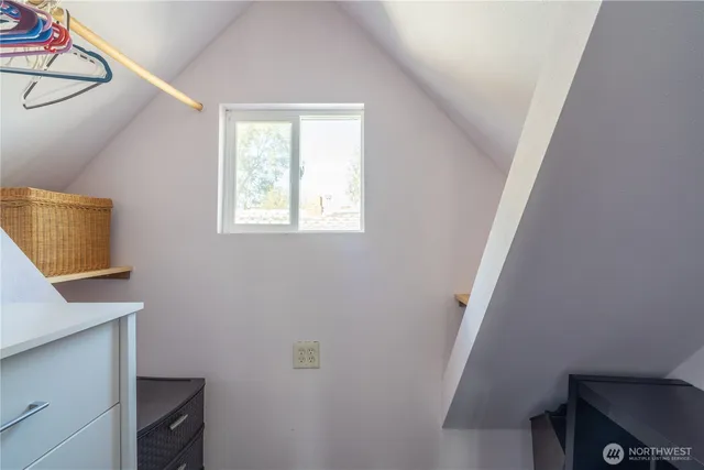 a room with window and a wooden floor