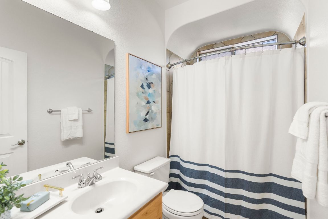 7809 Tusman Drive Austin, TX 78735 - Photo 12 of 40 Full bath downstairs