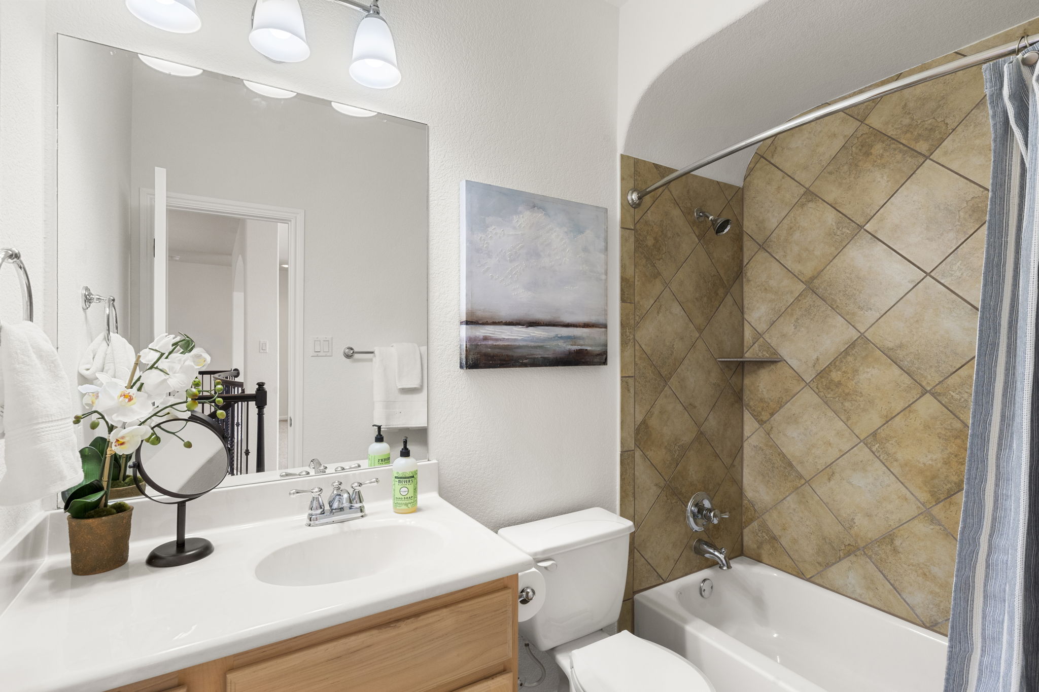 7809 Tusman Drive Austin, TX 78735 - Photo 26 of 38 a bathroom with a sink toilet and shower