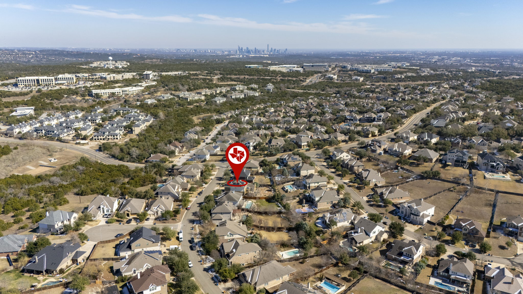 7809 Tusman Drive Austin, TX 78735 - Photo 36 of 38 an aerial view of a city with lots of residential buildings
