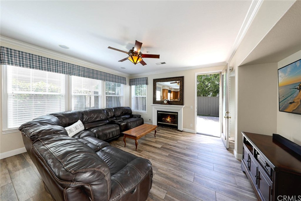 22 Calle Clasico San Clemente, CA 92673 - Photo 13 of 48 a living room with furniture and a flat screen tv