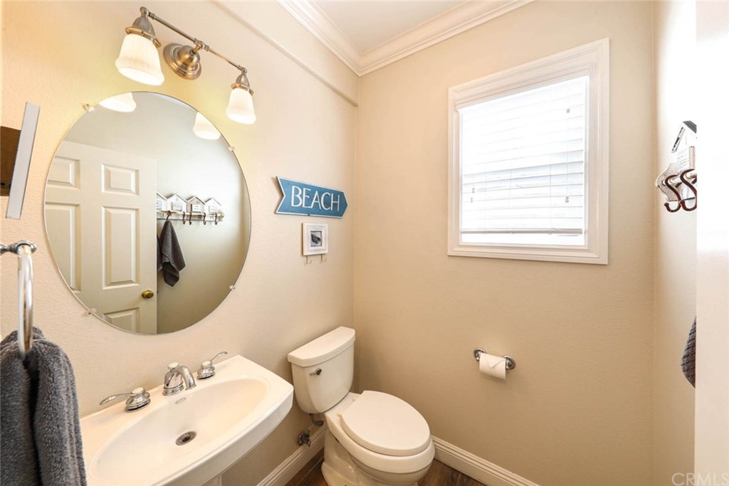 22 Calle Clasico San Clemente, CA 92673 - Photo 15 of 48 a bathroom with a toilet sink and mirror