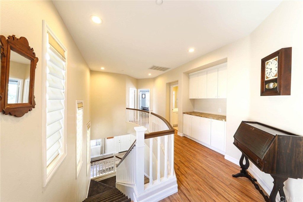 22 Calle Clasico San Clemente, CA 92673 - Photo 17 of 48 a view of a hallway with furniture and a window