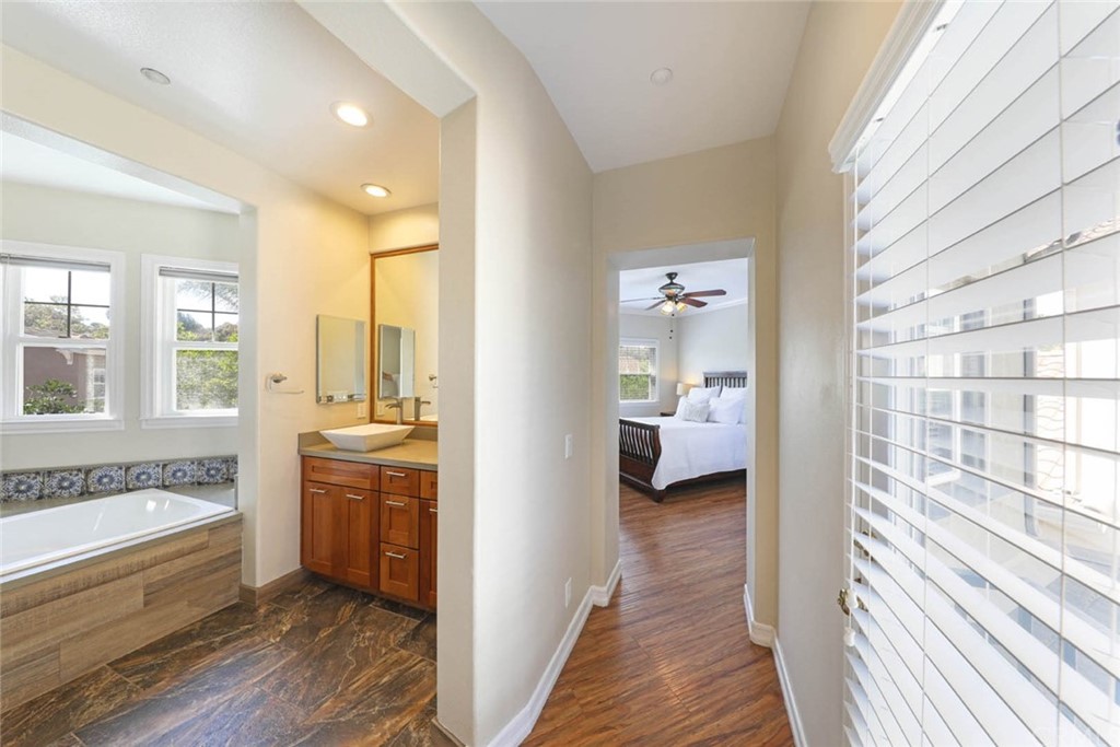 22 Calle Clasico San Clemente, CA 92673 - Photo 18 of 48 a en suite spacious bathroom with a granite countertop tub and a large window