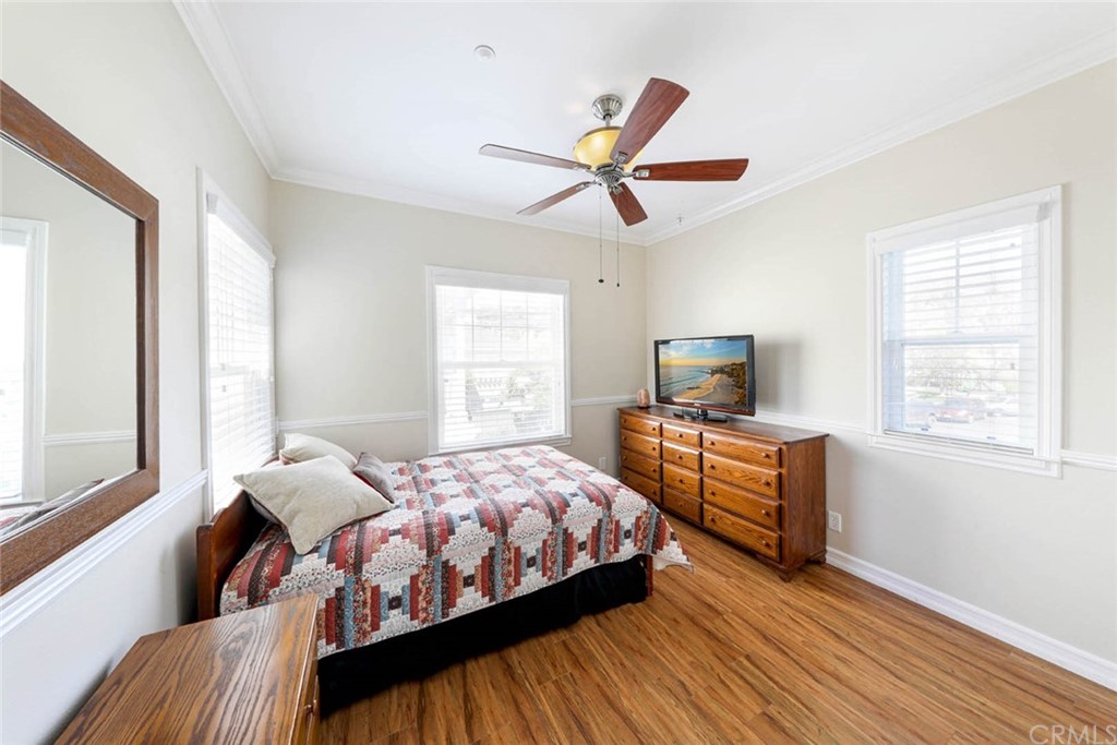 22 Calle Clasico San Clemente, CA 92673 - Photo 23 of 48 a bedroom with a bed and a window