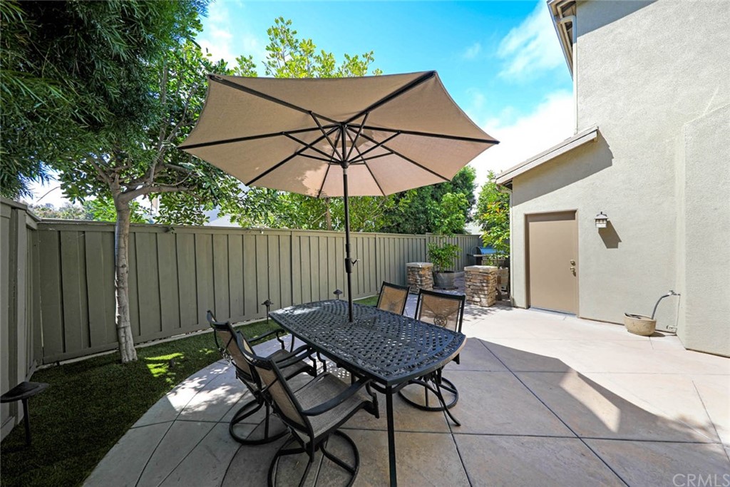 22 Calle Clasico San Clemente, CA 92673 - Photo 29 of 48 a backyard of a house with table and chairs