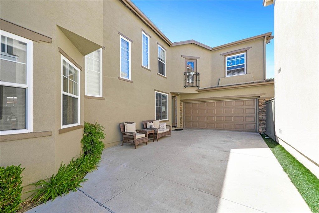 22 Calle Clasico San Clemente, CA 92673 - Photo 3 of 48 a view of patio with a table and chairs and potted plants