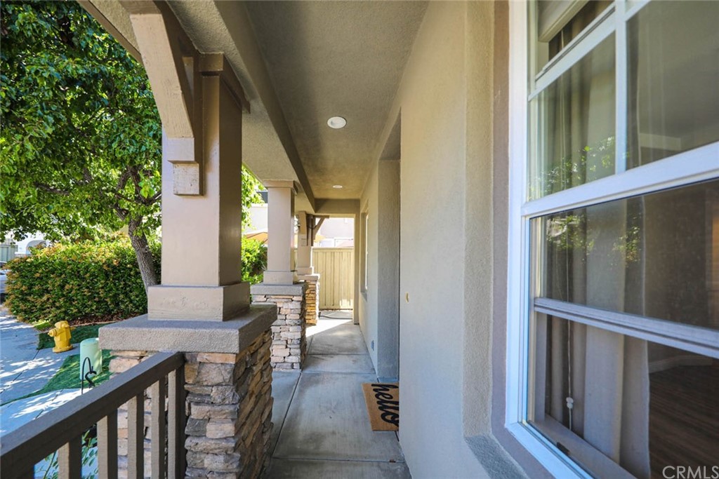 22 Calle Clasico San Clemente, CA 92673 - Photo 4 of 48 a view of a porch with chairs and potted plants
