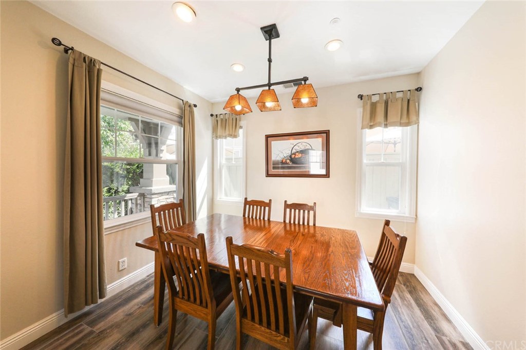 22 Calle Clasico San Clemente, CA 92673 - Photo 7 of 48 a view of a dining room with furniture window and wooden floor