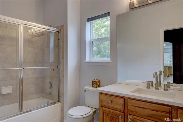 a view of a storage and utility room with washer and dryer