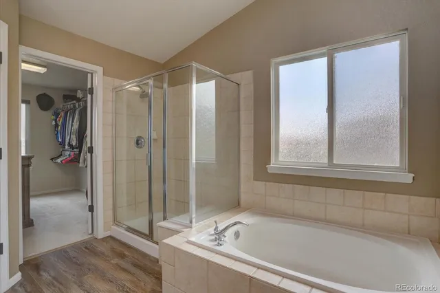 a view of a hallway with a chandelier