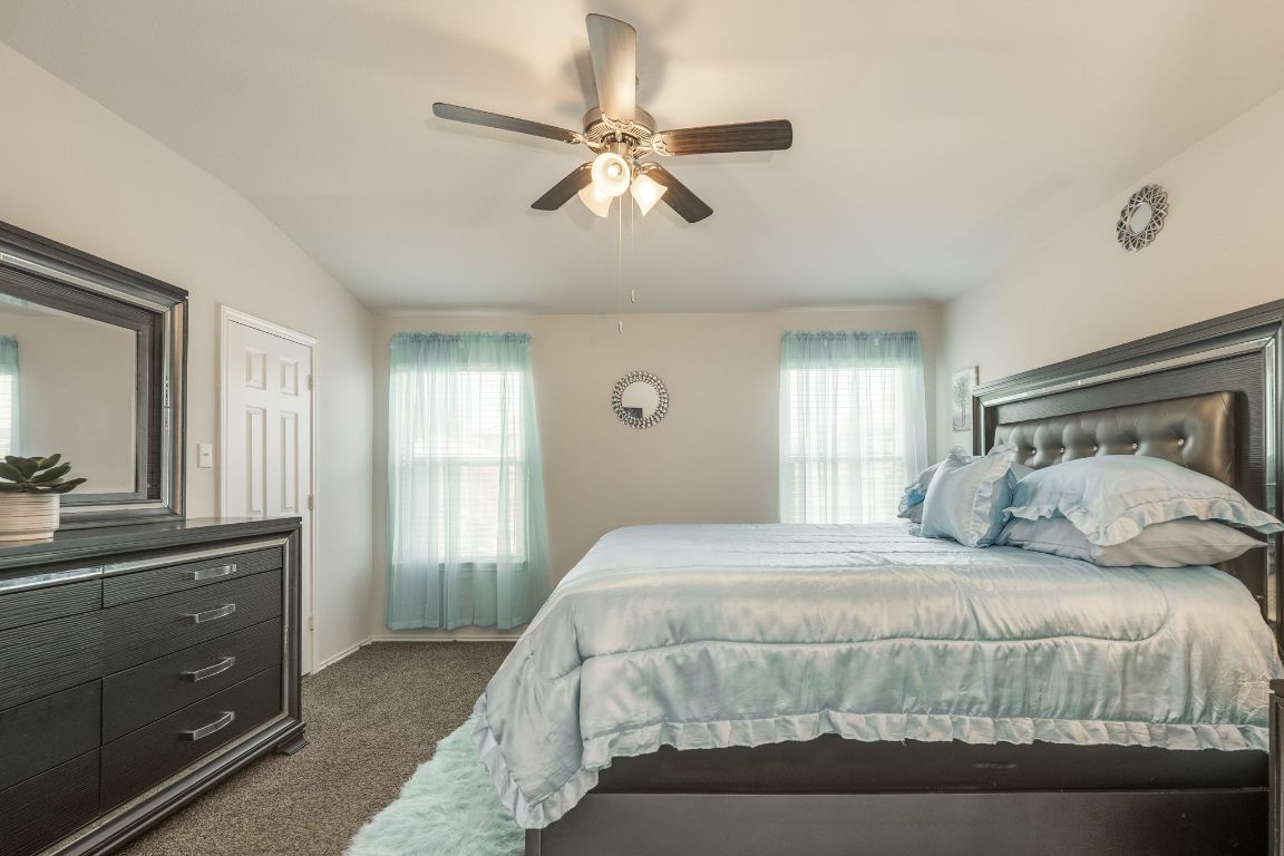 8932 Ranger Smt Road Temple, TX 76502 - Photo 25 of 40 a bedroom with a large bed and a dresser