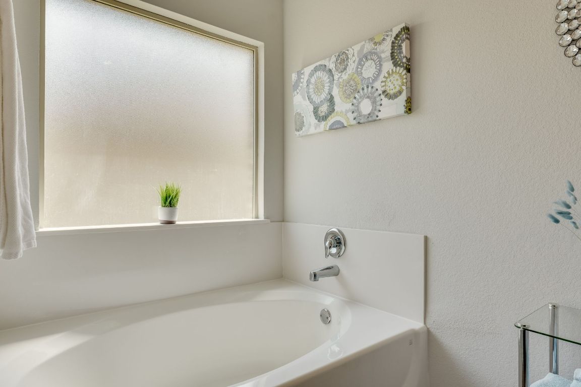 8932 Ranger Smt Road Temple, TX 76502 - Photo 27 of 40 a white bath tub sitting next to a white wall