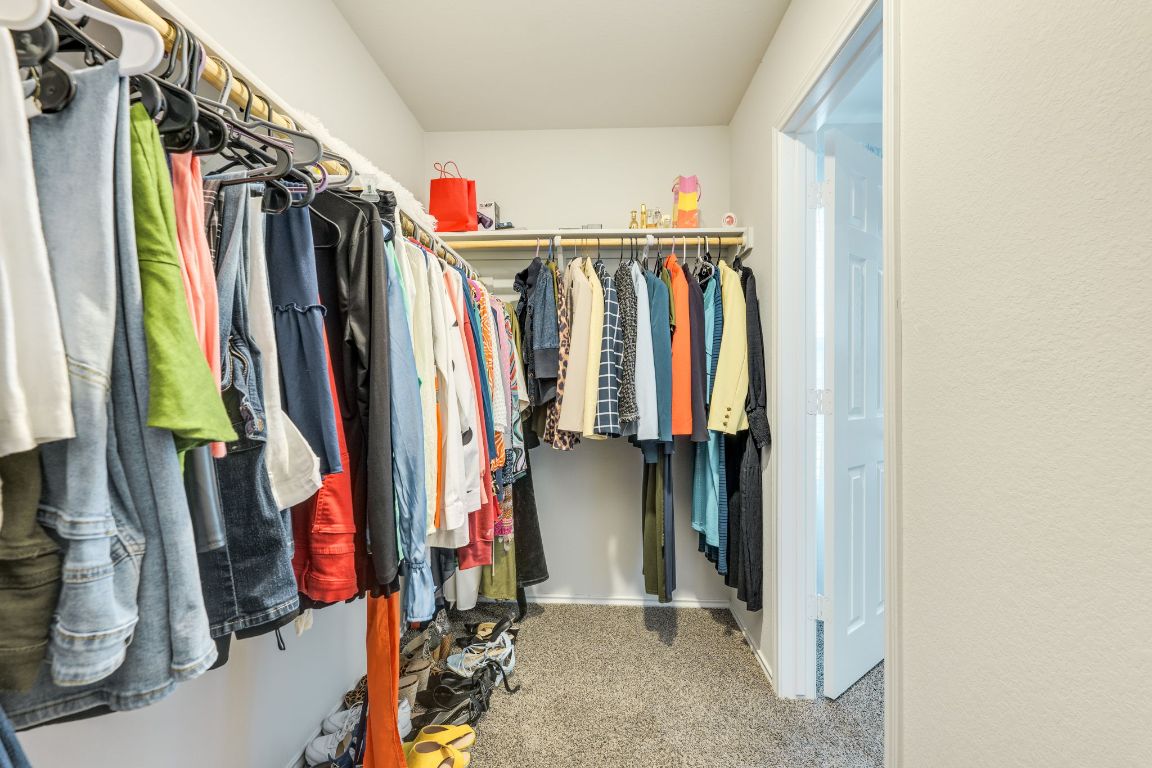 8932 Ranger Smt Road Temple, TX 76502 - Photo 30 of 40 a view of walk in closet with clothes