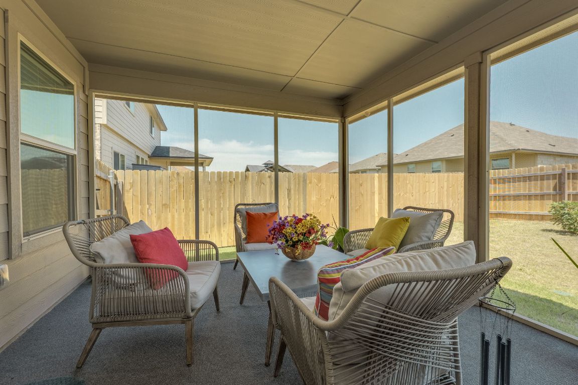 8932 Ranger Smt Road Temple, TX 76502 - Photo 31 of 40 a living room with furniture and floor to ceiling windows