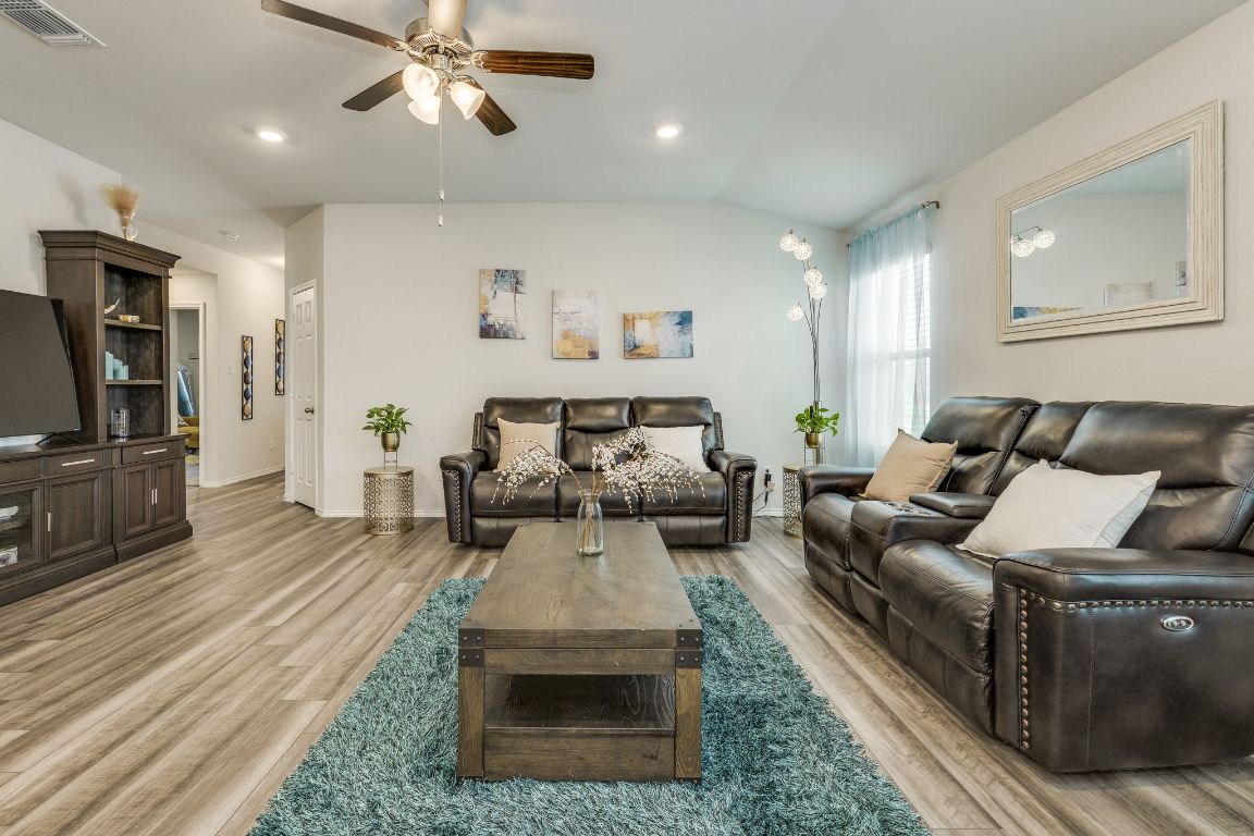 8932 Ranger Smt Road Temple, TX 76502 - Photo 9 of 40 a living room with furniture and a flat screen tv