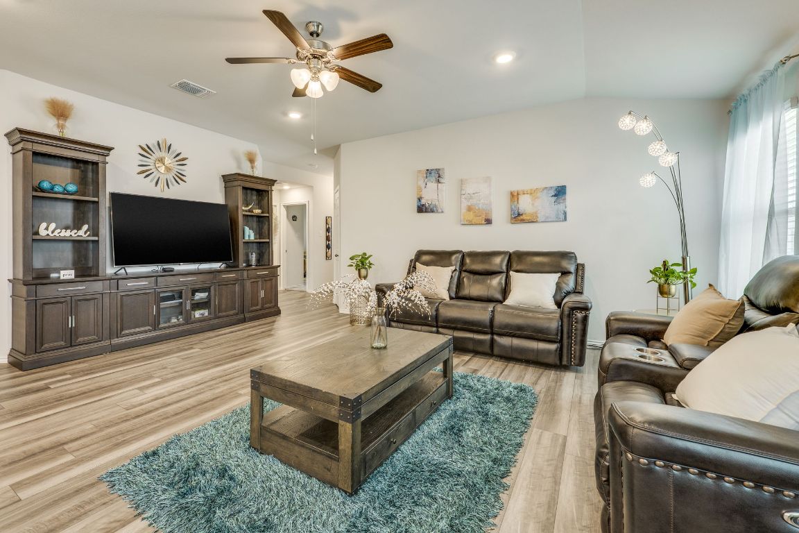 8932 Ranger Smt Road Temple, TX 76502 - Photo 10 of 40 a living room with furniture and a flat screen tv