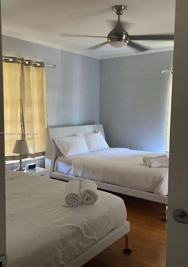1319 Fillmore Street Hollywood, FL 33019 - Photo 12 of 12 a bedroom with a bed and a window