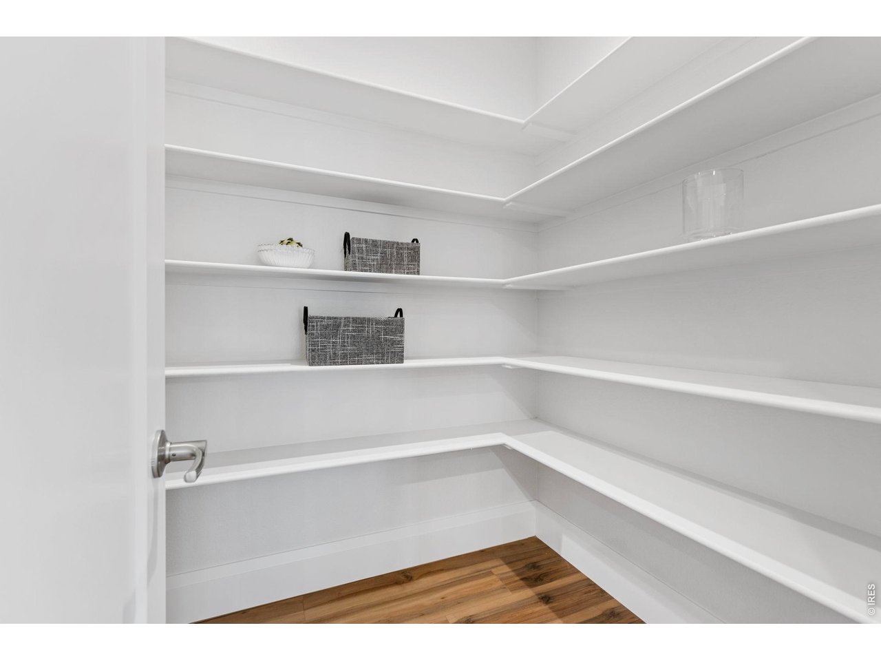5700 West 2nd Street Road Greeley, CO 80634 - Photo 14 of 40 A large pantry right off the kitchen provides ample useable storage