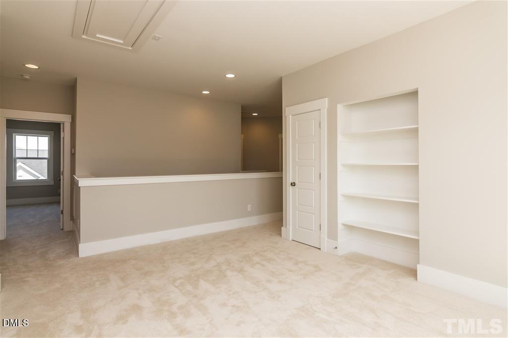 14 Tarwick Avenue Chapel Hill, NC 27516 - Photo 19 of 47 a view of an empty room with a window