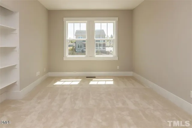 an empty room with a window