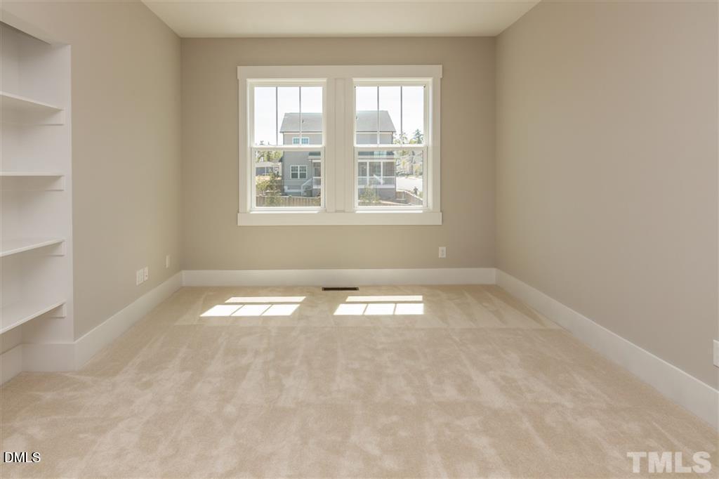 14 Tarwick Avenue Chapel Hill, NC 27516 - Photo 20 of 47 an empty room with a window