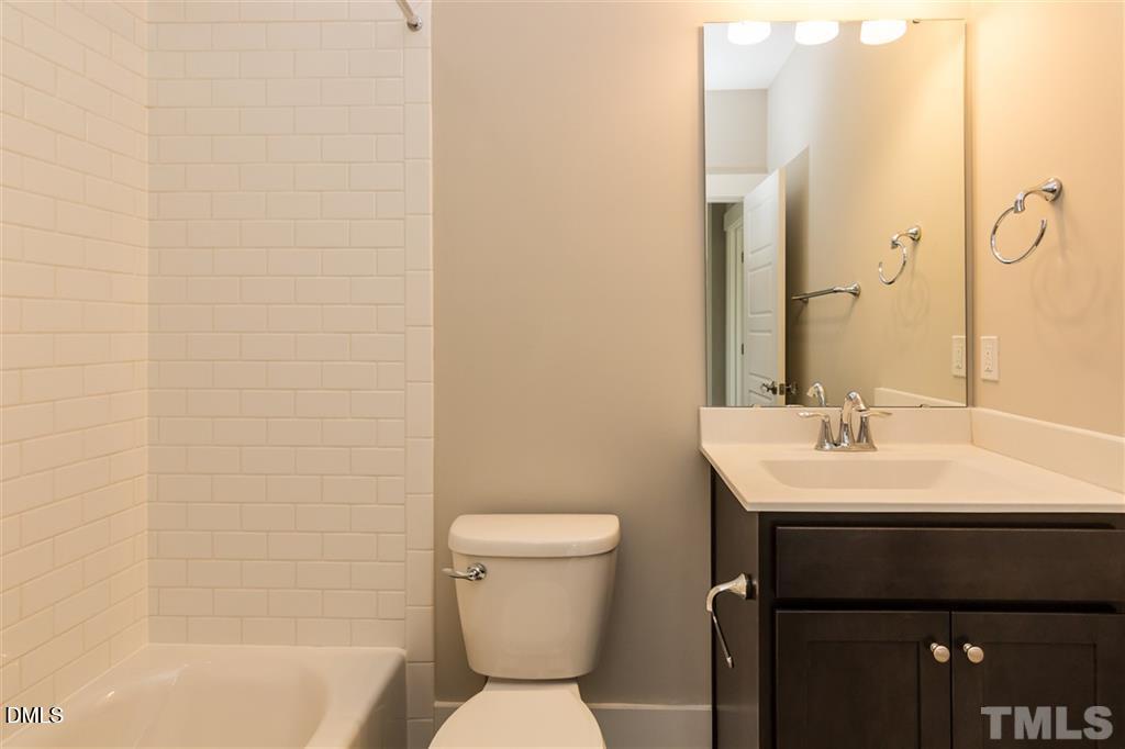 14 Tarwick Avenue Chapel Hill, NC 27516 - Photo 25 of 47 a bathroom with a sink a toilet and shower