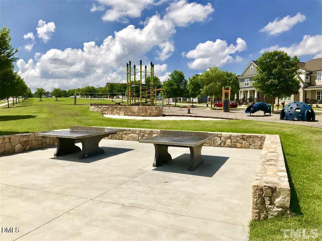 14 Tarwick Avenue Chapel Hill, NC 27516 - Photo 39 of 47 a view of a swimming pool and outdoor seating