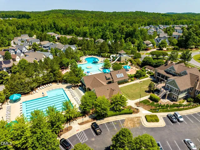 an aerial view of a house with a garden