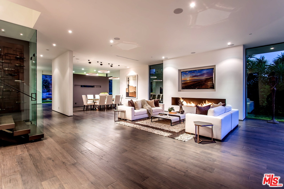 1424 Rising Glen Road Los Angeles, CA 90069 - Photo 30 of 48 a living room with furniture and a flat screen tv