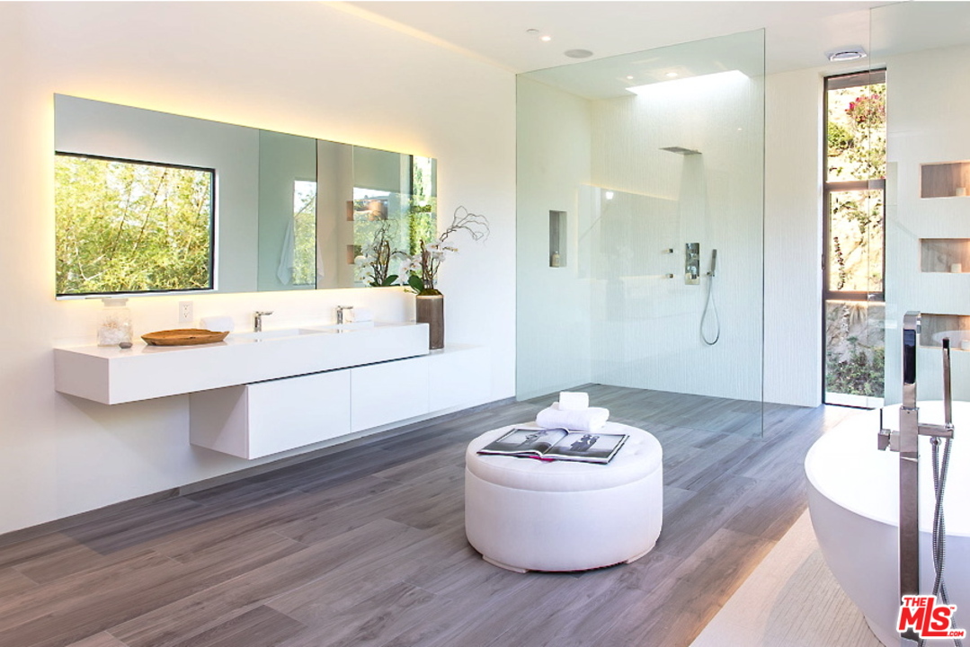 1424 Rising Glen Road Los Angeles, CA 90069 - Photo 37 of 48 a room with a table and chairs