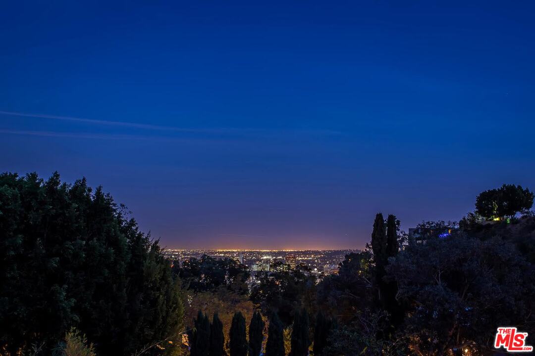 1424 Rising Glen Road Los Angeles, CA 90069 - Photo 5 of 48 a view of sunset