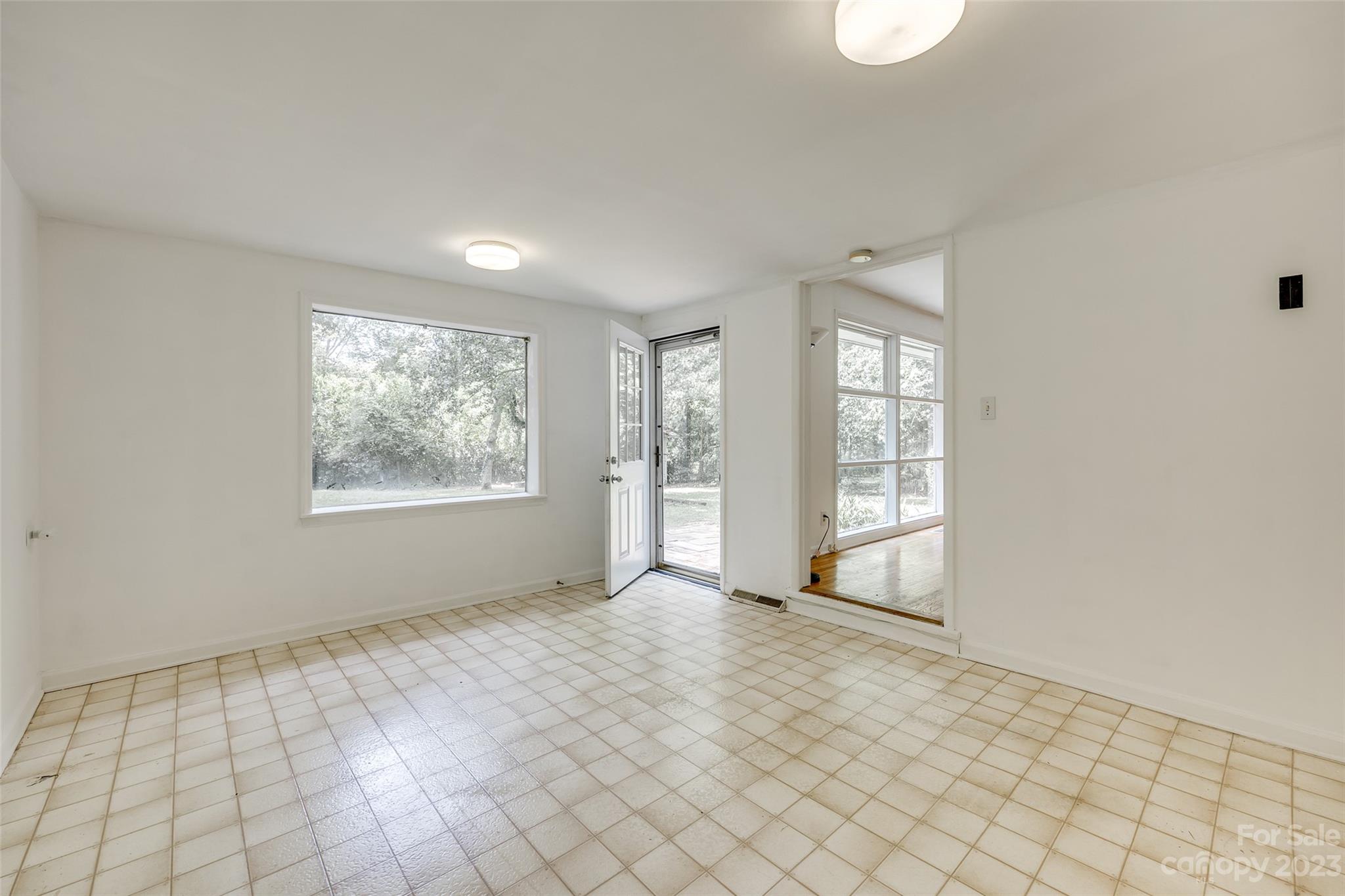1136 East Woodlawn Road Charlotte, NC 28209 - Photo 21 of 27 a view of an empty room with window