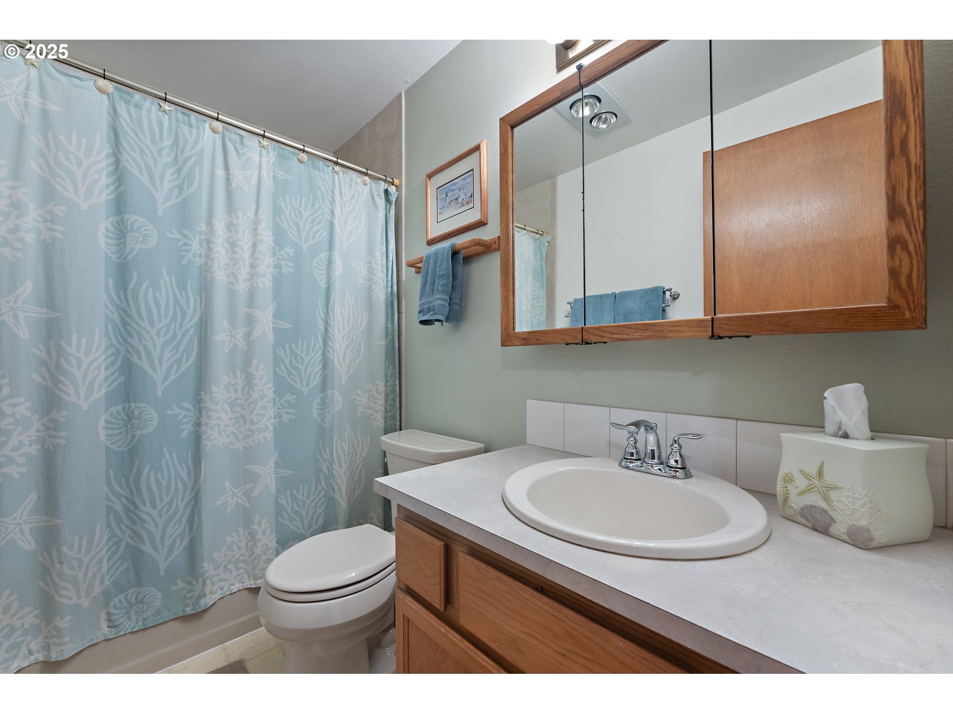 18100 Southwest Barcelona Way Beaverton, OR 97007 - Photo 22 of 41 a bathroom with a sink toilet and shower