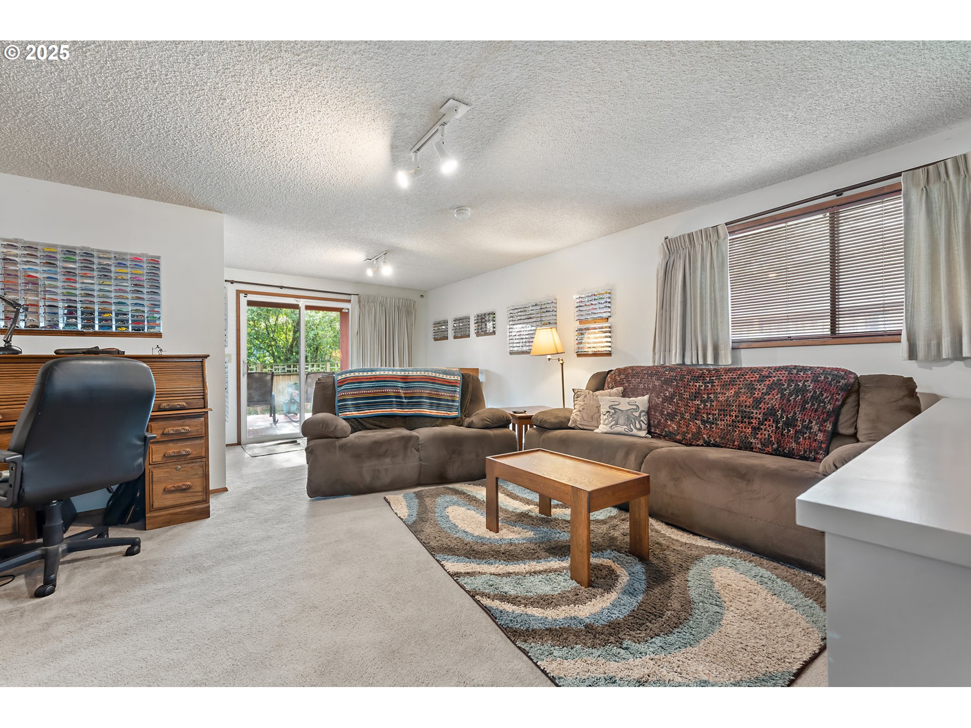 18100 Southwest Barcelona Way Beaverton, OR 97007 - Photo 25 of 41 a living room with furniture and a window