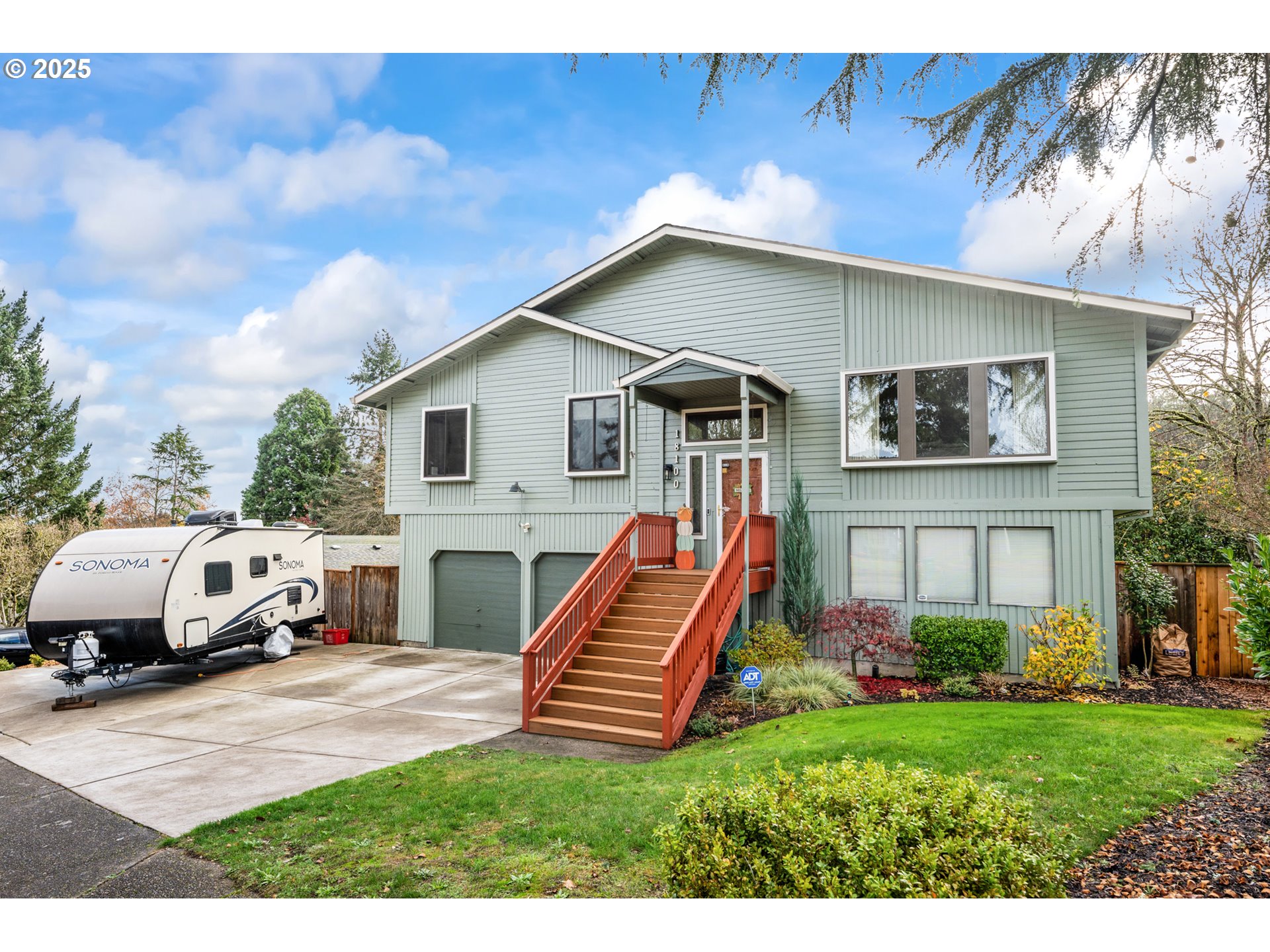 18100 Southwest Barcelona Way Beaverton, OR 97007 - Photo 3 of 41 a house view with a garden space