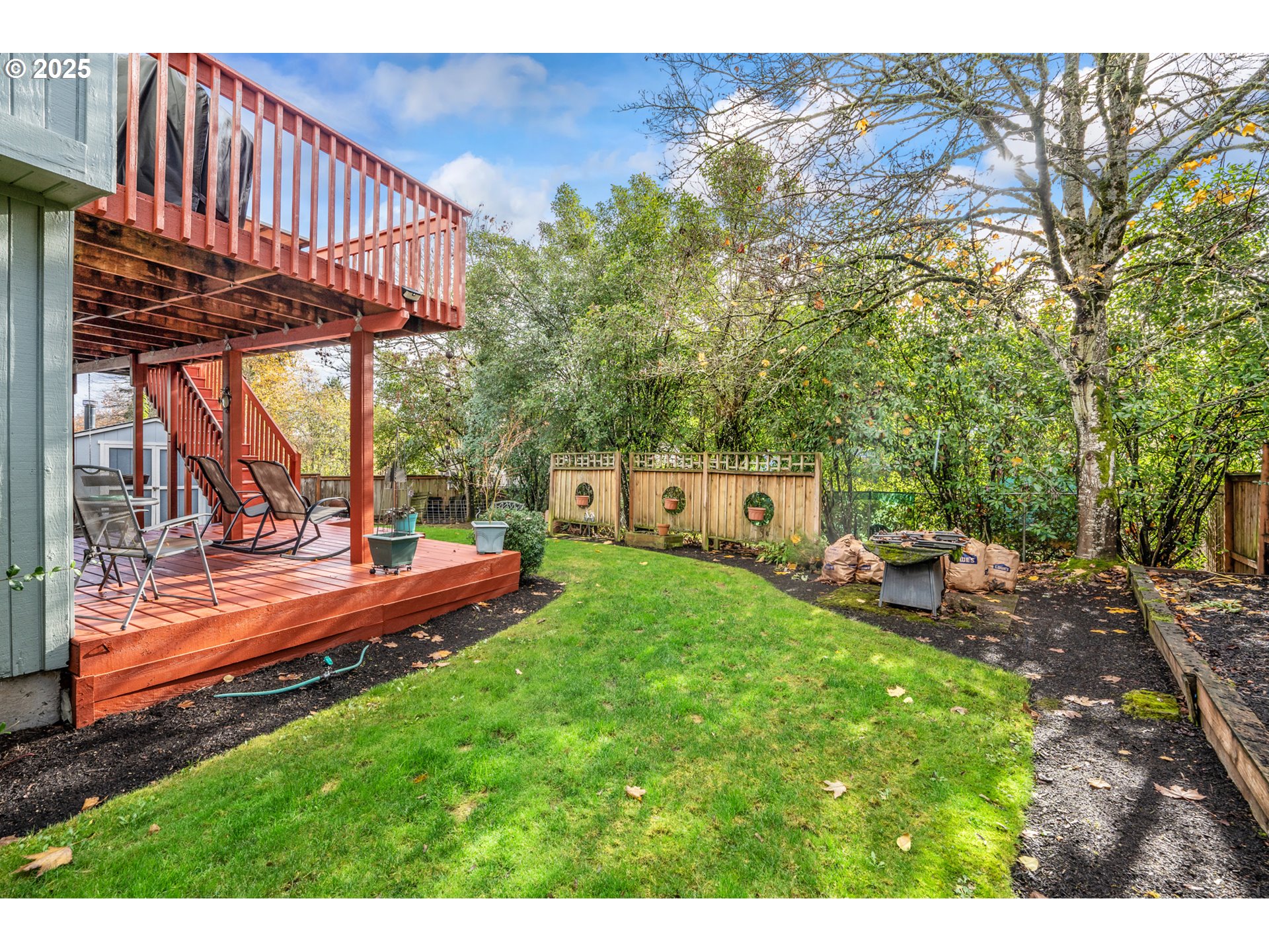 18100 Southwest Barcelona Way Beaverton, OR 97007 - Photo 34 of 41 a view of a house with backyard and sitting area