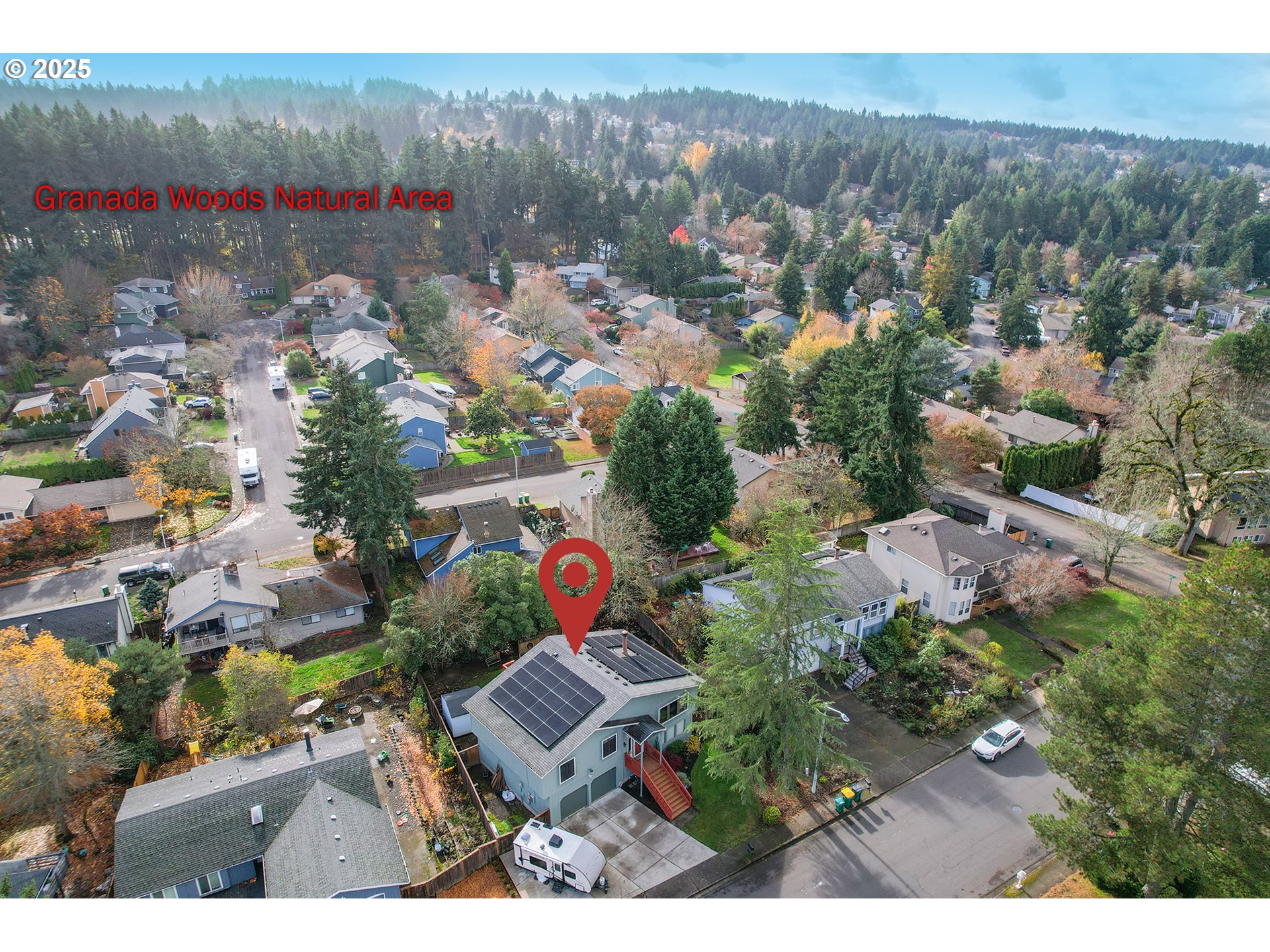 18100 Southwest Barcelona Way Beaverton, OR 97007 - Photo 40 of 41 an aerial view of a house with a garden
