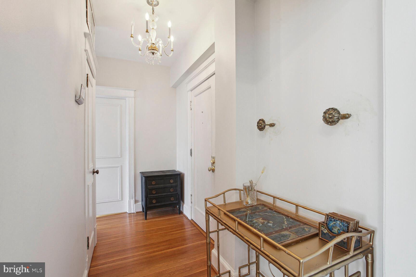 18 9th Street Northeast, Unit 401 Washington, DC 20002 - Photo 9 of 16 a view of a livingroom with furniture and wooden floor