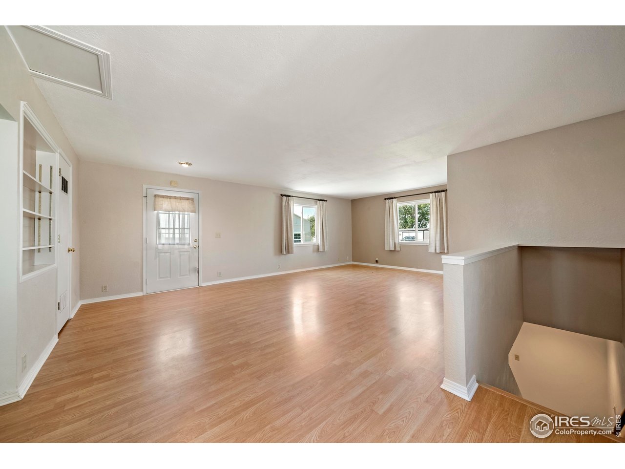 15260 County Road South Fort Morgan, CO 80701 - Photo 20 of 39 Back living room - Entrance to basement!