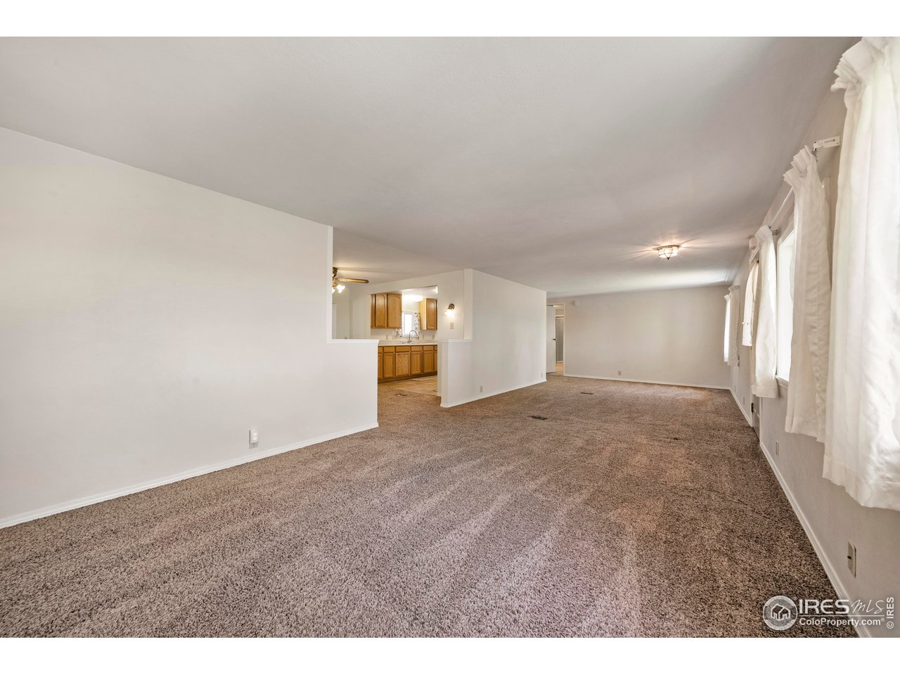 15260 County Road South Fort Morgan, CO 80701 - Photo 10 of 39 HUGE front living room!