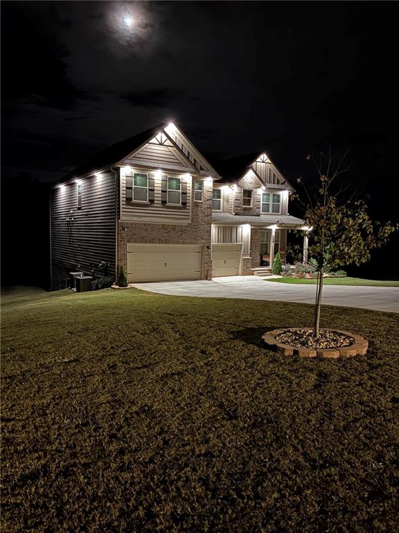 161 Donovan Avenue Locust Grove, GA 30248 - Photo 27 of 42 a front view of a house with a yard