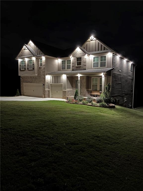 161 Donovan Avenue Locust Grove, GA 30248 - Photo 28 of 42 a front view of a house with a yard