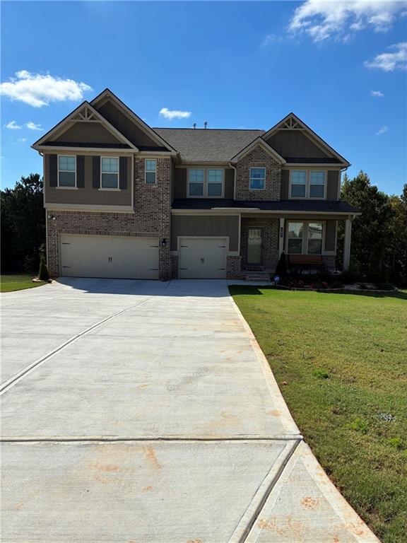 161 Donovan Avenue Locust Grove, GA 30248 - Photo 3 of 42 a front view of a house with yard