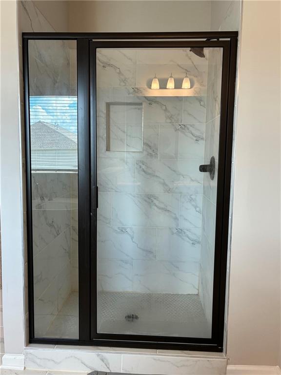 161 Donovan Avenue Locust Grove, GA 30248 - Photo 32 of 42 a view of bathroom with shower