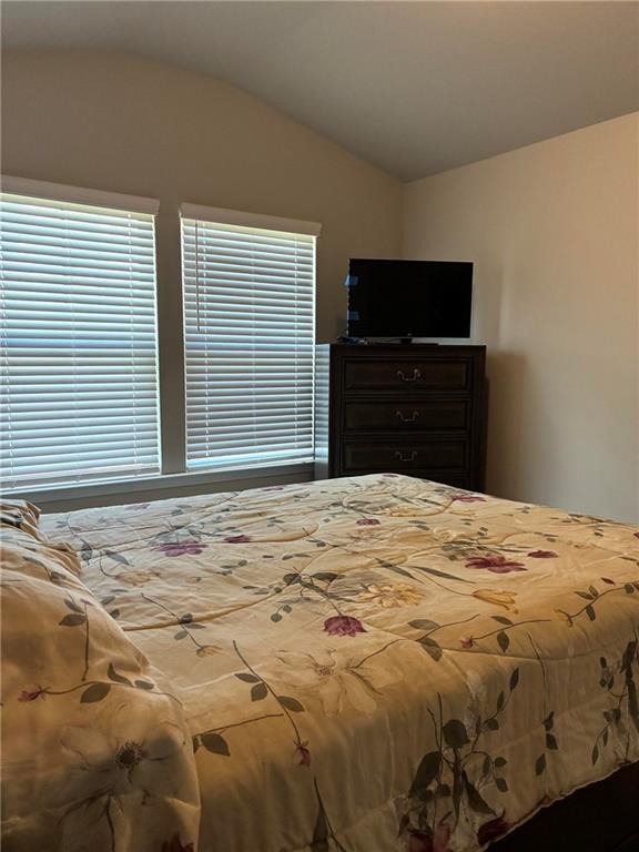 161 Donovan Avenue Locust Grove, GA 30248 - Photo 40 of 42 a bedroom with a bed and a television