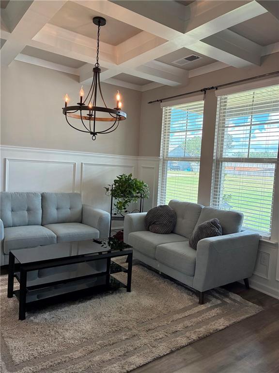 161 Donovan Avenue Locust Grove, GA 30248 - Photo 10 of 42 a living room with furniture ceiling fan and a window