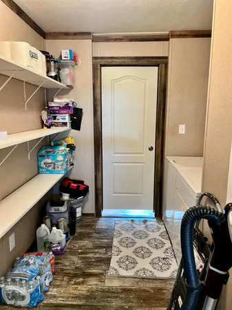 a bedroom with a bed and a window in it