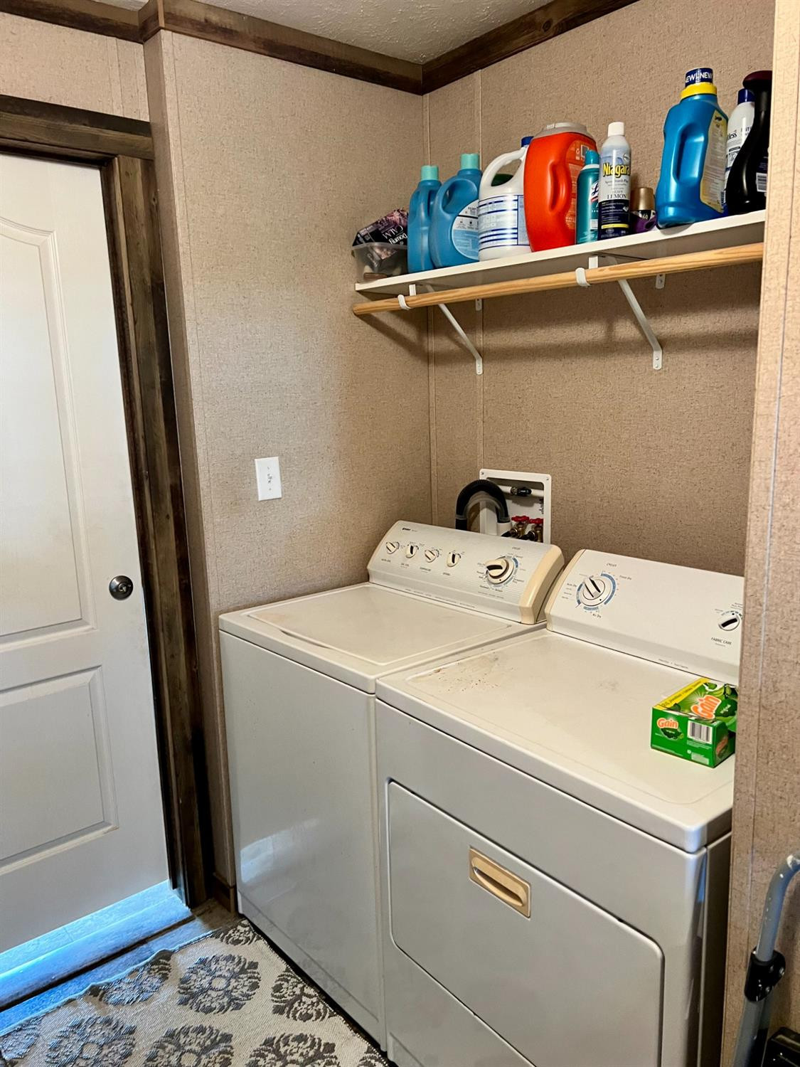 1021 Avenue North Ralls, TX 79357 - Photo 12 of 29 a utility room with dryer and washer