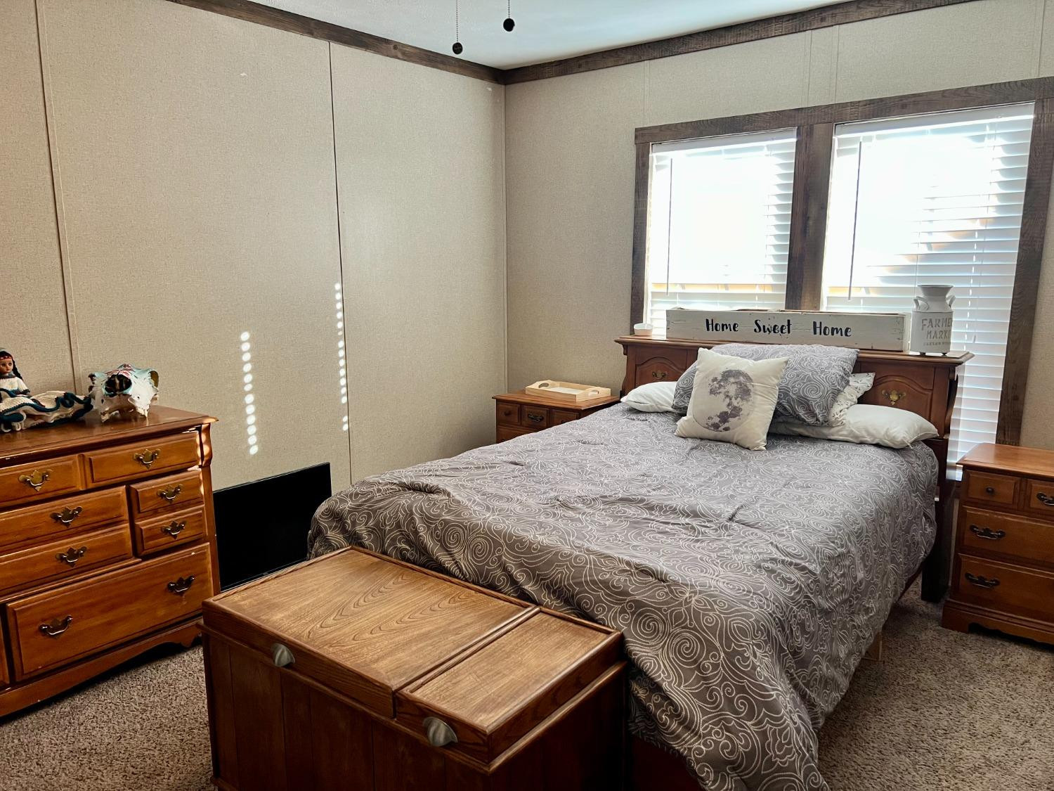 1021 Avenue North Ralls, TX 79357 - Photo 20 of 29 a bedroom with a bed and a window